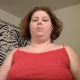 An obese, mature woman records herself pissing and taking a soft, runny shit while sitting on a toilet. No product is shown. Presented in 720P HD. About 4 minutes.
